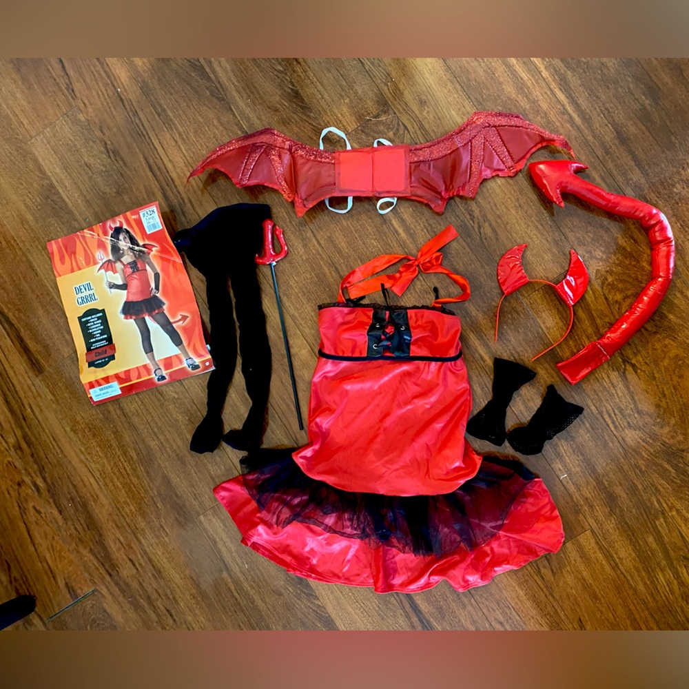 Child’s Devil girl costume.  Worn once. Really cute.